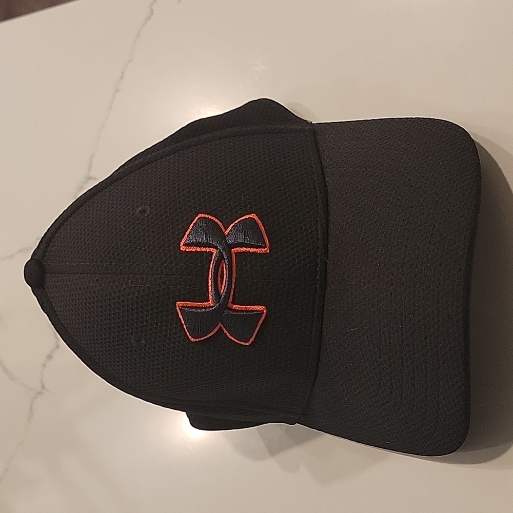 Under Armour hat outlined in pink size medium